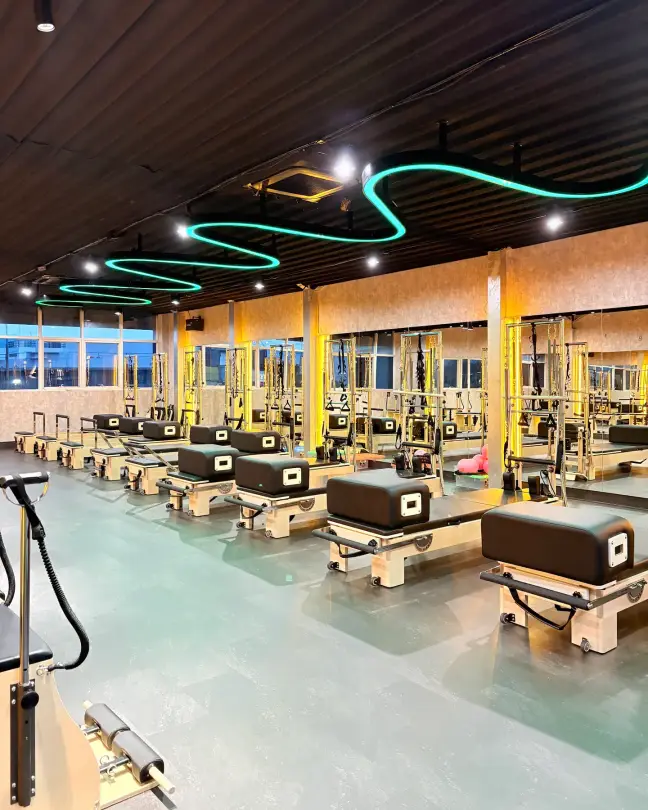 Rows of pilates reformers